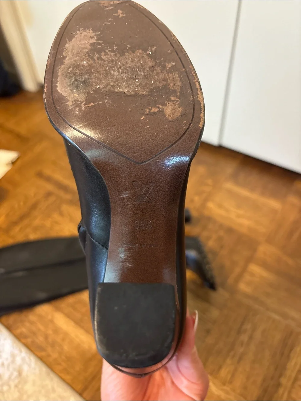 Louis Vuitton Black Leather Knee-High Heeled Boots with Gold Accents